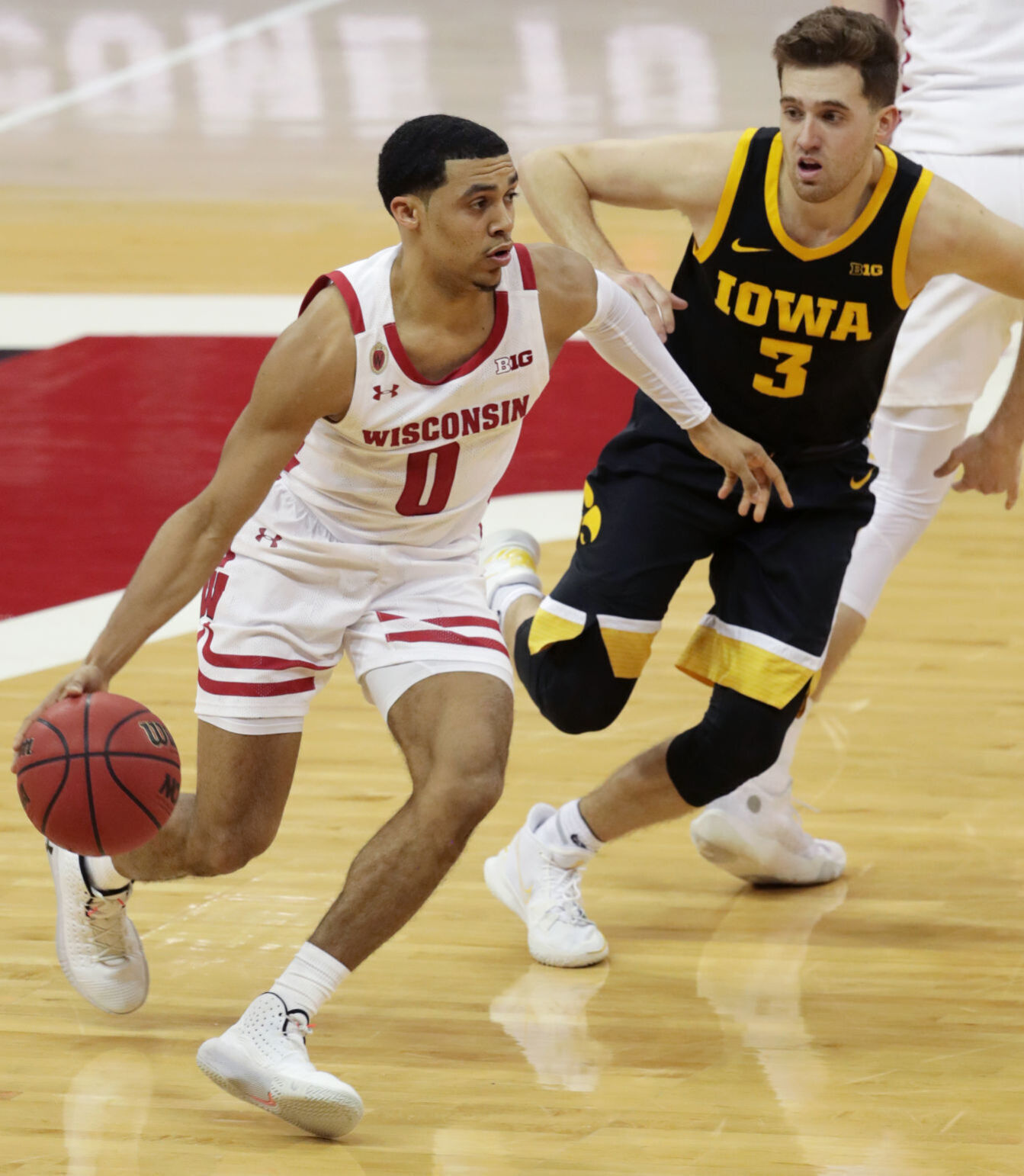Iowa 77, UW 62